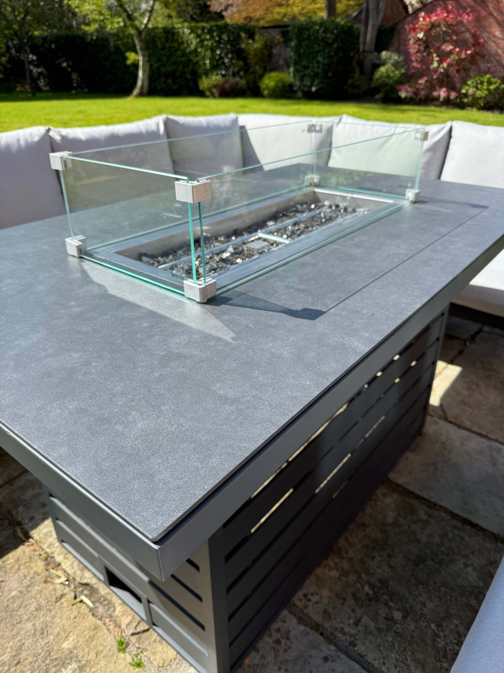 Torino Aluminium Fire Pit outdoor corner sofa set with rising table and integrated gas fire pit.