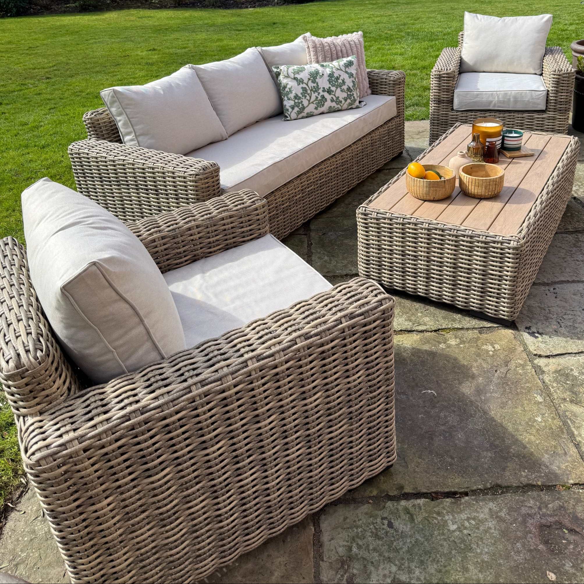 Portofino Grand Weave garden furniture sofa set with oversized PE rattan weave and neutral cushions in outdoor corner lounge arrangement